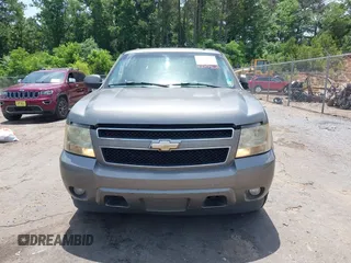 2007 Chevrolet Tahoe LT z VIN 1GNFC130X7R263516, wystawiony jako IAAI lot #42259629 z przebiegiem 215 970 mil mil oraz . Historia ofert i sprzedaży dostępna na DreamBid. Obrazek 6.