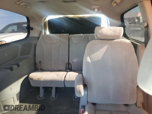 2009 Kia Sedona LX with VIN KNDMB233496272221, listed as a Copart auction lot 81194384 with 227,139 mi miles and Salvage Title. Bid and sale history available at carsss.com. Image 10.
