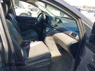 2014 Honda Odyssey Touring with VIN 5FNRL5H97EB101169, listed as a IAAI auction lot 41869233 with 142,147 mi miles and . Bid and sale history available at DreamBid. Image 5.