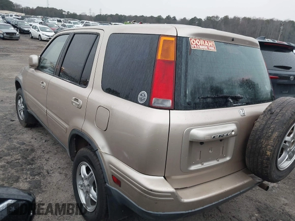 2000 Honda CR-V SE with VIN JHLRD1877YS023555, listed as a IAAI auction lot 41625009 with 164,000 mi miles. Bid and sale history available at carsss.com. Image 3.