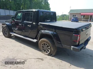2020 Jeep Gladiator Overland with VIN 1C6HJTFG8LL176164, listed as a IAAI auction lot 42482369 with 80,009 mi miles and . Bid and sale history available at DreamBid. Image 3.