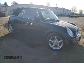 2006 MINI Convertible with VIN WMWRF33576TG15523, listed as a Copart auction lot 54199155 with 60,512 mi miles and Clean Title. Bid and sale history available at DreamBid. Image 4.