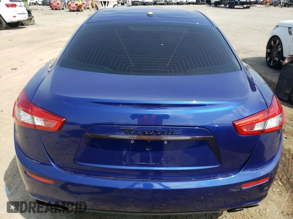 2015 Maserati Ghibli S Q4 with VIN ZAM57RTA6F1143107, listed as a Copart auction lot 68583743 with 70,264 mi miles. Bid and sale history available at carsss.com. Image 6.