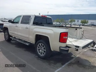 2014 GMC Sierra 1500 Denali z VIN 3GTU2WEJ3EG551266, wystawiony jako IAAI lot #41631624 z przebiegiem 120 214 mil mil oraz . Historia ofert i sprzedaży dostępna na DreamBid. Obrazek 3.