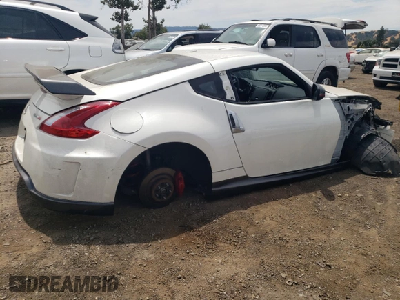 2014 Nissan 370Z with VIN JN1AZ4EH2EM631397, listed as a Copart auction lot 65758844 with 0 mi miles and Salvage Title. Bid and sale history available at carsss.com. Image 3.