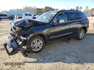 2014 BMW X5 sDrive35i with VIN 5UXKR2C57E0H31275, listed as a Copart auction lot 88526435 with 0 mi miles and Salvage Title. Bid and sale history available at carsss.com. Image 1.
