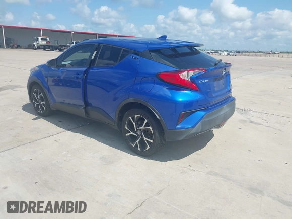 2018 Toyota C-HR XLE z VIN NMTKHMBX5JR057407, wystawiony jako IAAI lot #42363412 z przebiegiem 155 673 mil mil oraz . Historia ofert i sprzedaży dostępna na DreamBid. Obrazek 3.