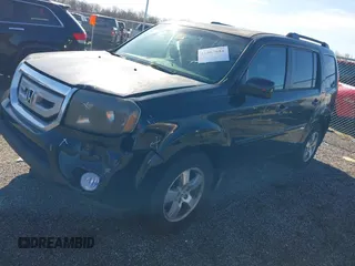 2011 Honda Pilot EX-L with VIN 5FNYF4H65BB004213, listed as a IAAI auction lot 41867681 with 157,644 mi miles and . Bid and sale history available at carsss.com. Image 17.