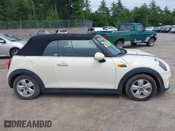 2019 MINI Convertible Cooper z VIN WMWWG5C52K3F79780, wystawiony jako IAAI lot #42622429 z przebiegiem 38 532 mil mil oraz . Historia ofert i sprzedaży dostępna na DreamBid. Obrazek 13.