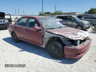 2001 Kia Sephia z VIN KNAFB121115074609, wystawiony jako Copart lot #72346144 z przebiegiem 88 400 mil mil oraz Tytuł czysty. Historia ofert i sprzedaży dostępna na DreamBid. Obrazek 4.