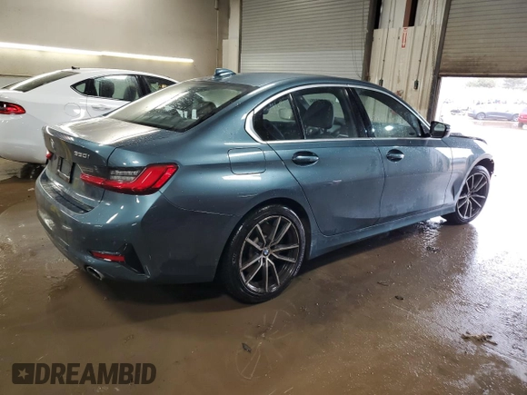 2019 BMW 3 Series 330i with VIN WBA5R1C51KFH14244, listed as a Copart auction lot 52199945 with 45,365 mi miles and Salvage title. Bid and sale history available at DreamBid. Image 3.