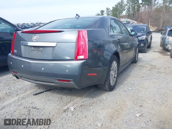 2012 Cadillac CTS Luxury with VIN 1G6DE5E58C0143175, listed as a IAAI auction lot 41612743 with 148,764 mi miles and . Bid and sale history available at DreamBid. Image 4.