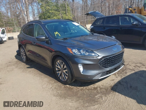 2020 Ford Escape Titanium Hybrid z VIN 1FMCU0DZ7LUB57978, wystawiony jako IAAI lot #41570242 z przebiegiem 32 819 mil mil oraz . Historia ofert i sprzedaży dostępna na DreamBid. Obrazek 1.