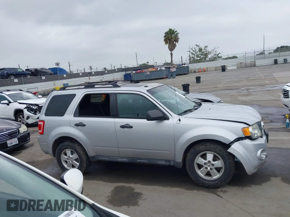 2012 Ford Escape XLT with VIN 1FMCU9D74CKB79211, listed as a IAAI auction lot 42464491 with 144,757 mi miles and . Bid and sale history available at DreamBid. Image 13.