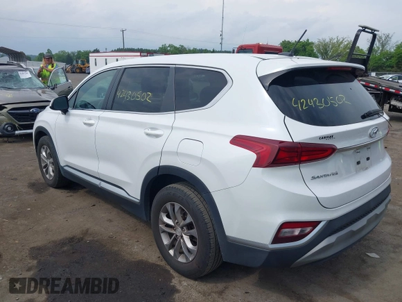 2019 Hyundai Santa Fe SE with VIN 5NMS23AD7KH111542, listed as a IAAI auction lot 42430502 with 78,755 mi miles and . Bid and sale history available at DreamBid. Image 3.