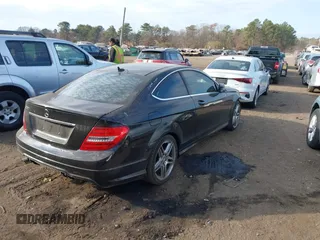 2015 Mercedes-Benz C-Class C 250 with VIN WDDGJ4HB4FG367188, listed as a IAAI auction lot 40912003 with 121,128 mi miles. Bid and sale history available at carsss.com. Image 4.