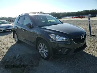 2014 Mazda CX-5 Grand Touring with VIN JM3KE4DY1E0405493, listed as a Copart auction lot 41688915 with 94,970 mi miles and Salvage Title. Bid and sale history available at carsss.com. Image 11.