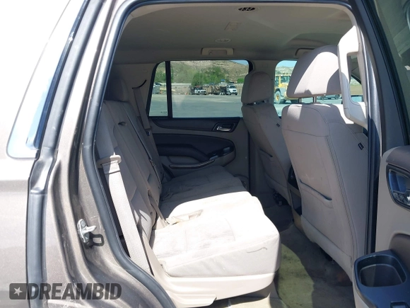 2016 Chevrolet Tahoe LS with VIN 1GNSCAKC7GR419294, listed as a IAAI auction lot 42020006 with 83,945 mi miles and . Bid and sale history available at DreamBid. Image 8.