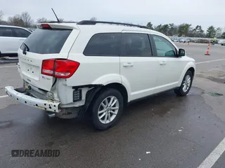 2013 Dodge Journey SXT with VIN 3C4PDCBG9DT564303, listed as a IAAI auction lot 41954764 with 132,125 mi miles. Bid and sale history available at carsss.com. Image 4.