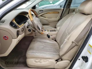 2000 Jaguar S-Type V6 z VIN SAJDA01C0YFL51640, wystawiony jako Copart lot #48708915 z przebiegiem 186 034 mil mil oraz Nie do naprawy • Non repairable. Historia ofert i sprzedaży dostępna na DreamBid. Obrazek 7.
