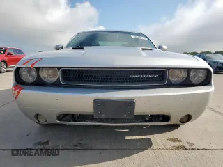2012 Dodge Challenger SXT Plus z VIN 2C3CDYAGXCH124857, wystawiony jako Copart lot #58558045 z przebiegiem 188 345 mil mil oraz Czysty tytuł • Clean title. Historia ofert i sprzedaży dostępna na DreamBid. Obrazek 5.