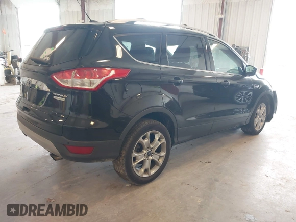 2014 Ford Escape Titanium с VIN 1FMCU0J9XEUA90770, выставлен на аукционе IAAI как лот 42354947 с пробегом 96 296 миль миль и . История ставок и продаж доступна на DreamBid. Изображение 4.