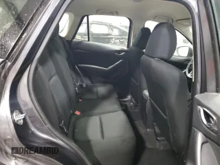 2014 Mazda CX-5 Sport with VIN JM3KE4BEXE0430076, listed as a Copart auction lot 58164695 with 183,130 mi miles and Salvage title. Bid and sale history available at DreamBid. Image 11.