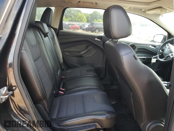 2013 Ford Escape Titanium z VIN 1FMCU0J94DUB90197, wystawiony jako Copart lot #59289925 z przebiegiem 200 006 mil mil oraz Czysty tytuł • Clean title. Historia ofert i sprzedaży dostępna na DreamBid. Obrazek 11.