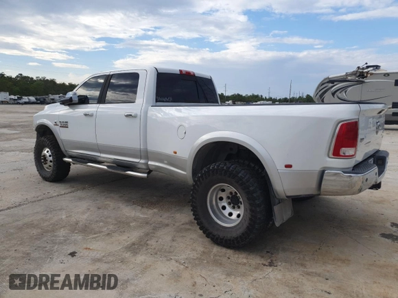 2015 Ram 3500 Laramie with VIN 3C63RRJL2FG661749, listed as a Copart auction lot 71062544 with 126,775 mi miles and Salvage Title. Bid and sale history available at carsss.com. Image 2.