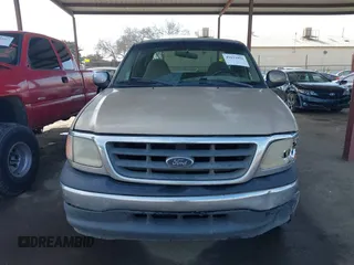 2000 Ford F-150 XL with VIN 1FTZX1723YKB48613, listed as a IAAI auction lot 41611851 with 187,450 mi miles. Bid and sale history available at carsss.com. Image 12.