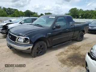 1999 Ford F-150 z VIN 1FTZX1720XKA84187, wystawiony jako Copart lot #61401055 z przebiegiem Nie podano mil oraz Szkoda całkowita • Salvage title. Historia ofert i sprzedaży dostępna na DreamBid. Obrazek 1.