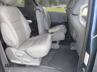 2016 Toyota Sienna XLE z VIN 5TDYK3DC0GS766059, wystawiony jako IAAI lot #42214738 z przebiegiem 143 001 mil mil oraz . Historia ofert i sprzedaży dostępna na DreamBid. Obrazek 8.