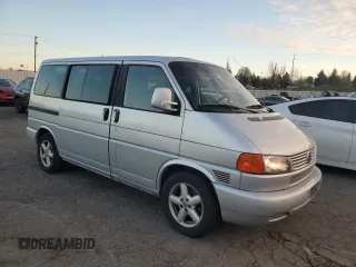 2003 Volkswagen EuroVan MV с VIN WV2MB47053H002505, выставлен на аукционе Copart как лот 83840884 с пробегом 250 786 миль миль и Чистый • Clean title. История ставок и продаж доступна на DreamBid. Изображение 4.