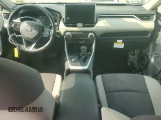 2023 Toyota RAV4 Hybrid XLE with VIN JTMRWRFV7PD166743, listed as a Copart auction lot 59964505 with 87,404 mi miles and Salvage title. Bid and sale history available at DreamBid. Image 8.