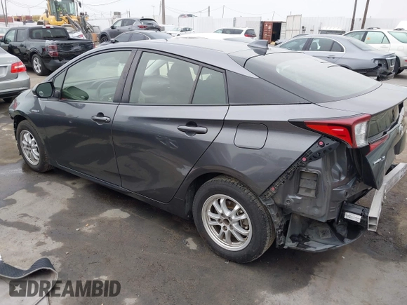 2021 Toyota Prius L Eco with VIN JTDKAMFU8M3144391, listed as a IAAI auction lot 42477718 with 314,346 mi miles and . Bid and sale history available at DreamBid. Image 3.