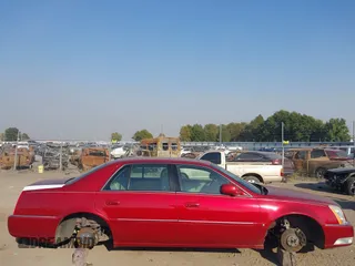 2008 Cadillac DTS 1SC with VIN 1G6KD57Y08U143396, listed as a IAAI auction lot 40618555 with 124,706 mi miles and . Bid and sale history available at carsss.com. Image 13.