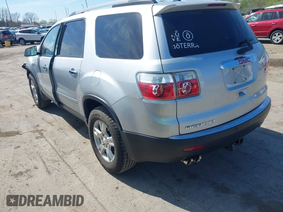 2012 GMC Acadia SLE with VIN 1GKKRPED2CJ405489, listed as a IAAI auction lot 42081026 with 130,932 mi miles. Bid and sale history available at carsss.com. Image 3.