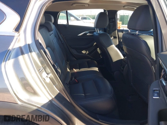 2018 Infiniti QX30 Premium z VIN SJKCH5CR7JA047290, wystawiony jako IAAI lot #41270760 z przebiegiem 72 169 mil mil oraz . Historia ofert i sprzedaży dostępna na DreamBid. Obrazek 8.
