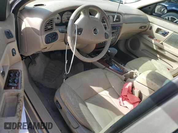 2003 Mercury Sable LS Premium z VIN 1MEFM59S03A606329, wystawiony jako Copart lot #79331624 z przebiegiem 152 059 mil mil oraz Nie do naprawy. Historia ofert i sprzedaży dostępna na DreamBid. Obrazek 8.