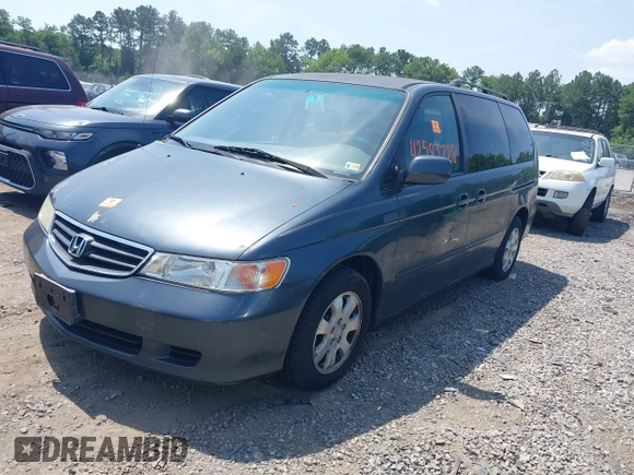 2004 Honda Odyssey EX-L with VIN 5FNRL18964B069905, listed as a IAAI auction lot 42583728 with 217,237 mi miles and . Bid and sale history available at DreamBid. Image 2.