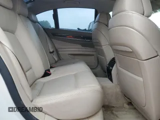 2012 BMW 7 Series 750i z VIN WBAKA8C51CCY37495, wystawiony jako Copart lot #56914295 z przebiegiem 126 697 mil mil oraz Tytuł czysty. Historia ofert i sprzedaży dostępna na DreamBid. Obrazek 10.