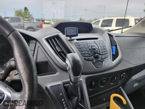 2016 Ford Transit Cargo with VIN 1FTYE1ZM5GKA76148, listed as a IAAI auction lot 42299673 with 150,587 mi miles and . Bid and sale history available at DreamBid. Image 16.
