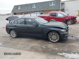 2014 BMW 3 Series 328i xDrive with VIN WBA3B5G56ENS06534, listed as a IAAI auction lot 41549553 with 165,779 mi miles and . Bid and sale history available at DreamBid. Image 13.