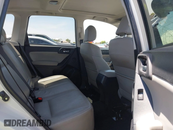 2015 Subaru Forester Touring with VIN JF2SJAWC8FH588321, listed as a IAAI auction lot 42689364 with 103,642 mi miles and . Bid and sale history available at DreamBid. Image 8.