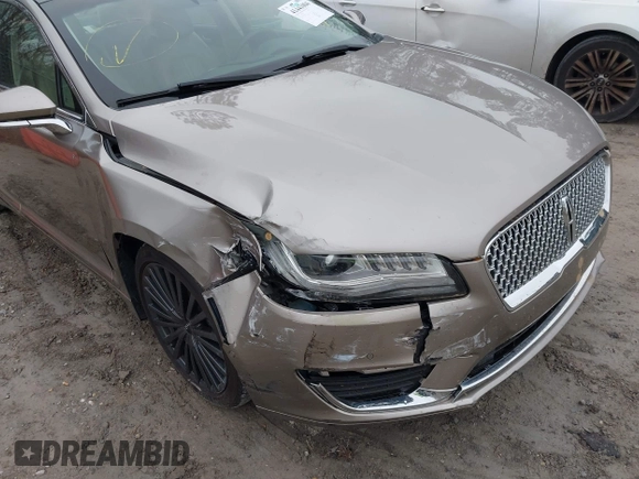 2018 Lincoln MKZ Hybrid Reserve z VIN 3LN6L5MU2JR602228, wystawiony jako IAAI lot #41441004 z przebiegiem 71 047 mil mil oraz . Historia ofert i sprzedaży dostępna na DreamBid. Obrazek 6.