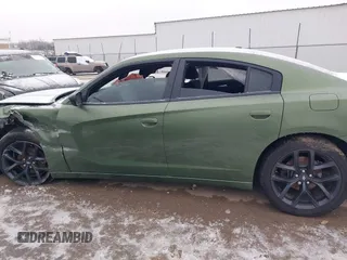 2021 Dodge Charger SXT with VIN 2C3CDXBG5MH570330, listed as a IAAI auction lot 41558328 with 119,828 mi miles. Bid and sale history available at carsss.com. Image 13.