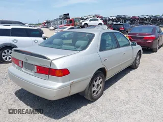 2000 Toyota Camry LE z VIN 4T1BF22K9YU102852, wystawiony jako IAAI lot #42084031 z przebiegiem 253 595 mil mil oraz . Historia ofert i sprzedaży dostępna na DreamBid. Obrazek 4.