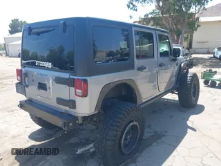 2018 Jeep Wrangler Unlimited Sport with VIN 1C4BJWDG4JL807265, listed as a IAAI auction lot 42520648 with 69,229 mi miles and . Bid and sale history available at DreamBid. Image 4.