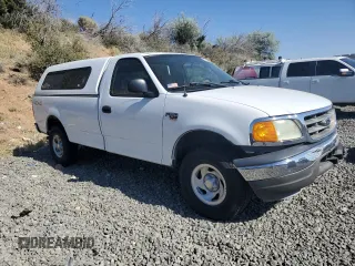2004 Ford F-150 XL with VIN 2FTRF18W54CA36334, listed as a Copart auction lot 63464375 with 253,805 mi miles and Salvage title. Bid and sale history available at DreamBid. Image 4.