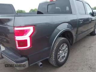 2020 Ford F-150 XL with VIN 1FTEW1C5XLFA97159, listed as a IAAI auction lot 41898490 with 121,674 mi miles and . Bid and sale history available at DreamBid. Image 4.